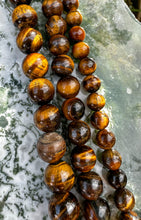 Load image into Gallery viewer, Tigers eye bead strand
